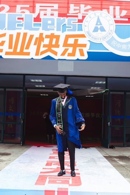 Graduation caps thrown in the air at a university ceremony